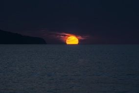 orange setting sun over the Azores