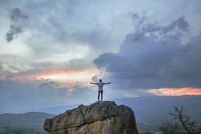 Person on Top Rock scene