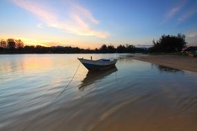 Picture of the Boat on a calm sea beach