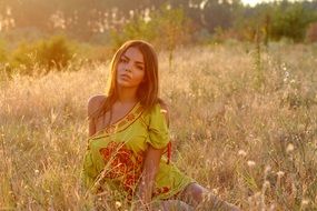 beautiful girl in the sunset rays