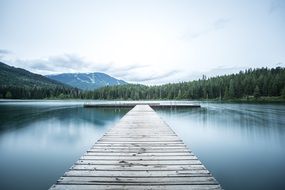 wood Pier near Water peaceful scene
