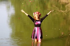 blonde in a wreath in the water