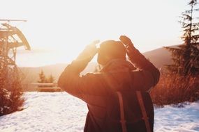 tourist under the cold winter light