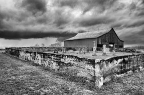 black and white picture of wooden barn