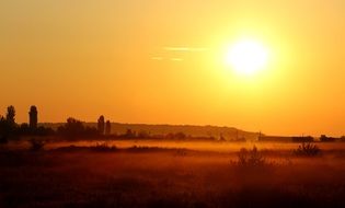 Morning Haze above field at Sunrise