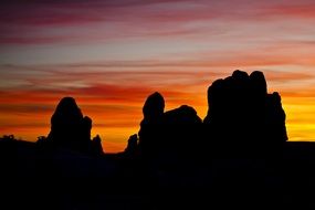 Sandstone Rock silhuettes at colorful sunset sky, usa, utah, arches national park