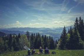 tourists admire the alps