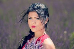 brunette woman with blue eyes in lavender field