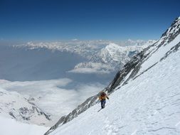 Skiing on a high mountain on a sunny day