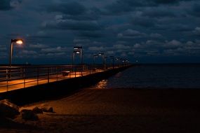 ocean pier night illumination