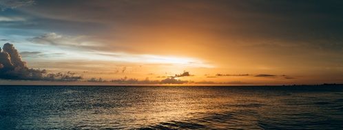 sunset over quiet water