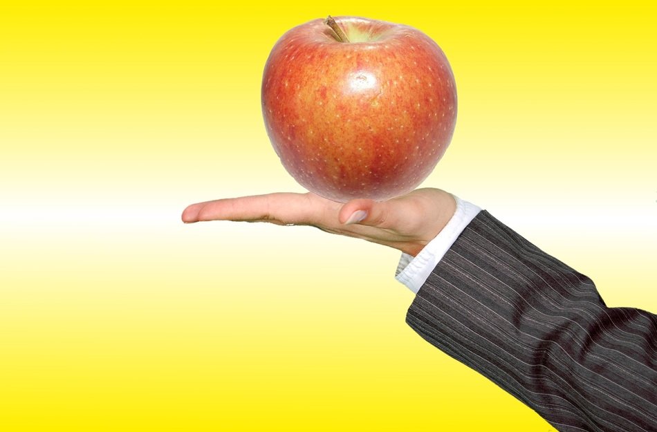 Apple in a hand