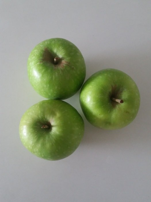 three green apples