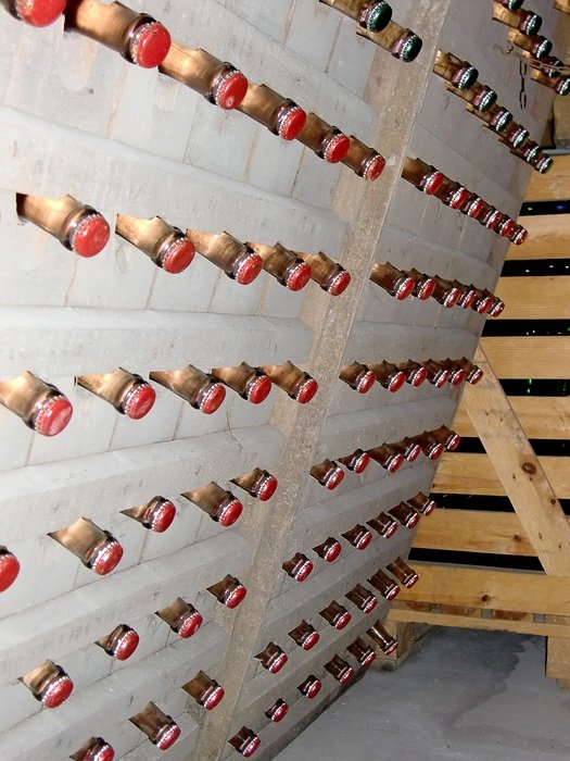 wine bottles on shelves