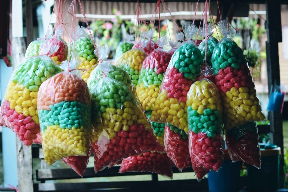 packs with colorful sweets for fish