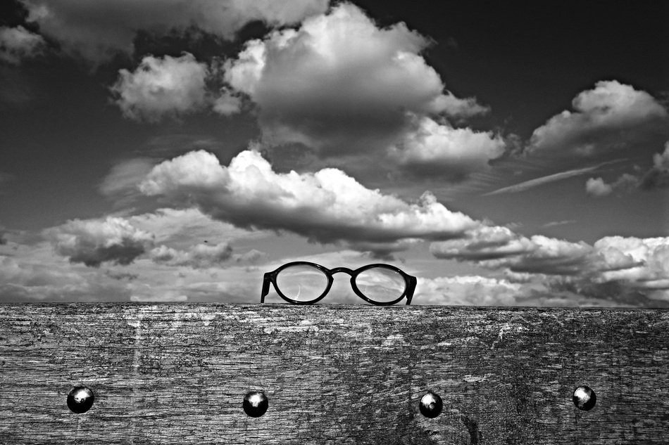reading glasses against the sky
