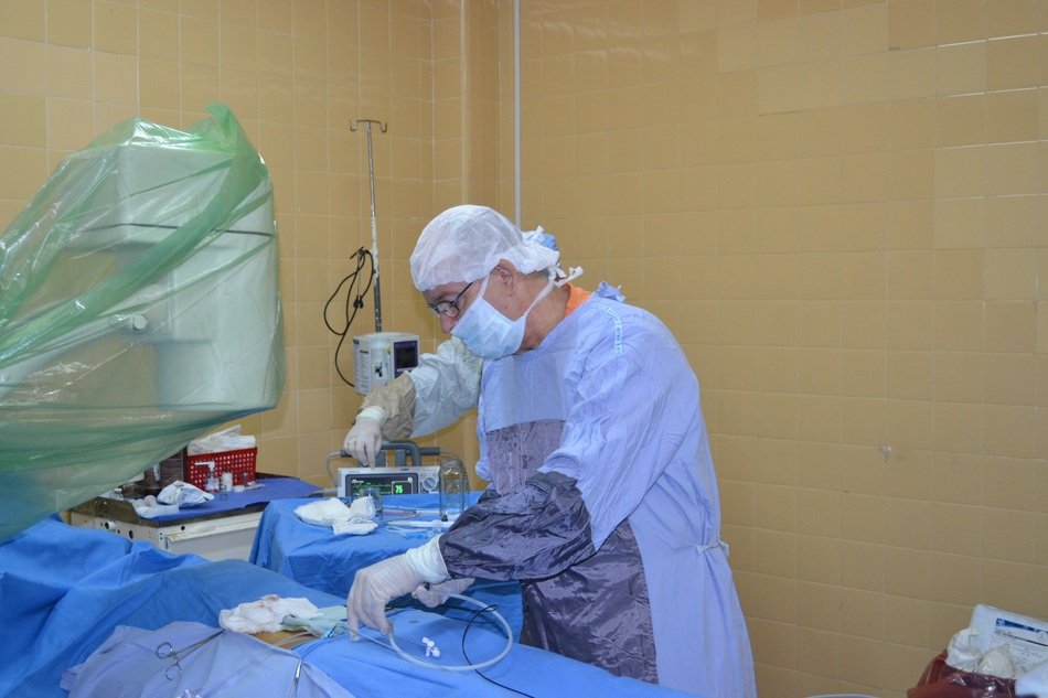 the surgeon does the surgery