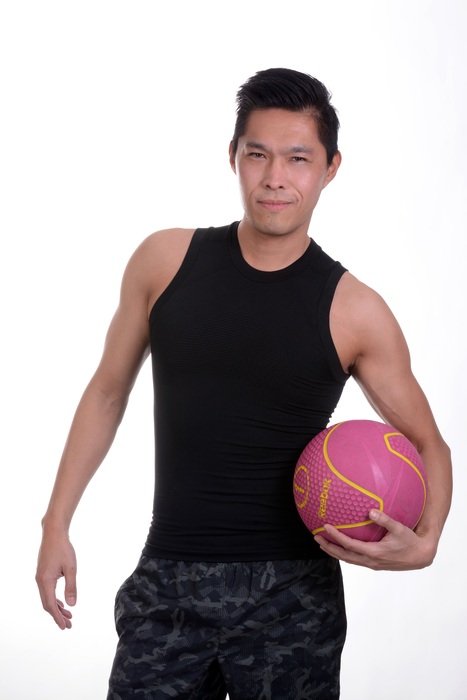 man with pink ball