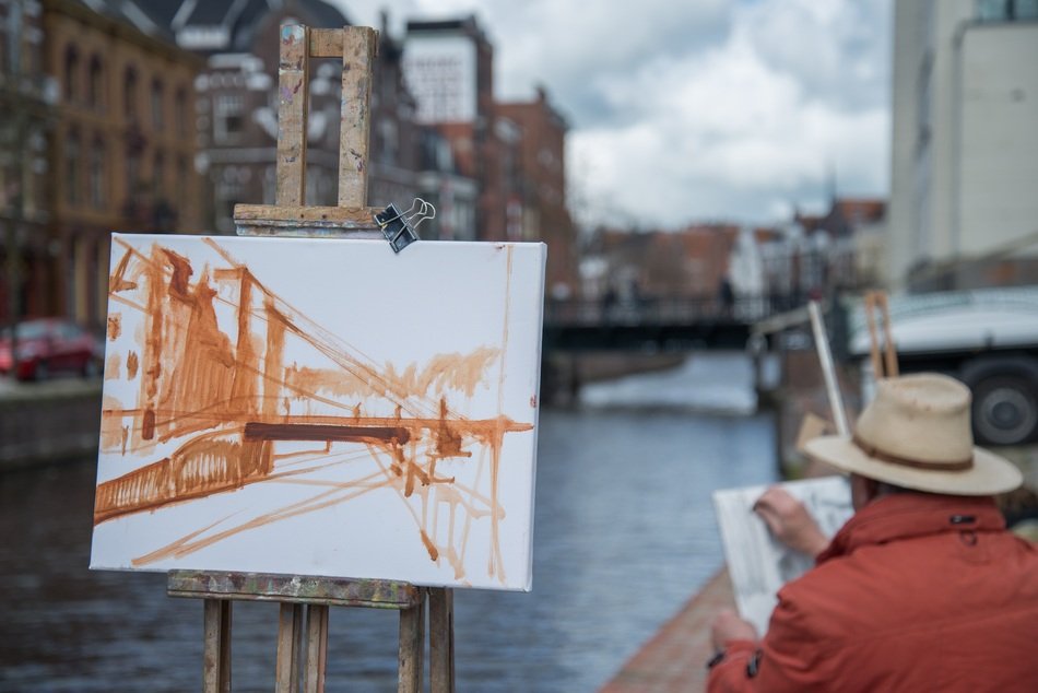 Painting and Artist at Work in city, denmark