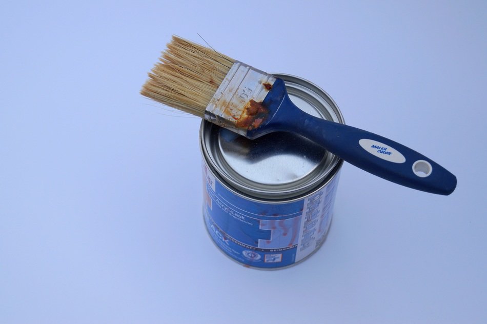a coat of paint with a dirty brush on it