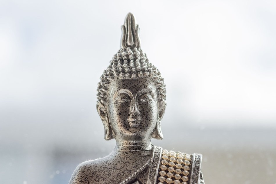 oriental idol on blurred background