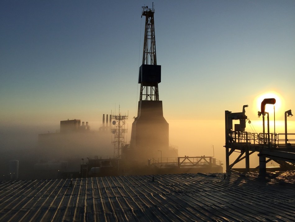 drilling rig in the rays of the sun