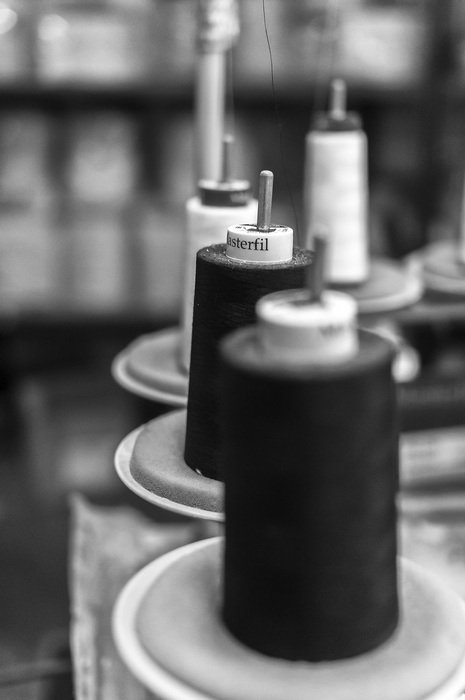 black and white image of the production of threads