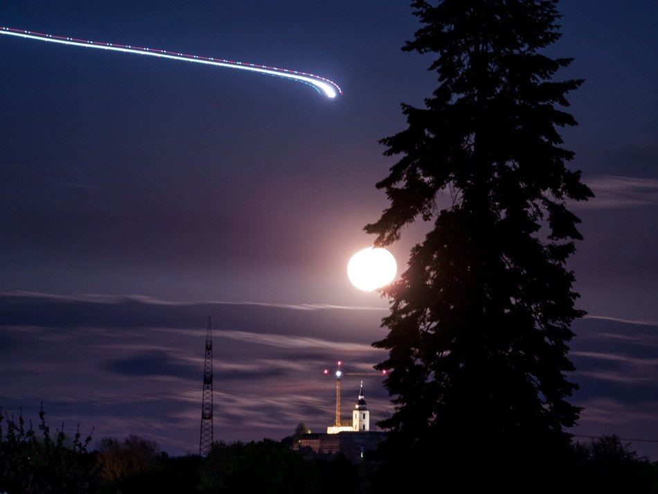full Moon and Aircraft in Night Sky