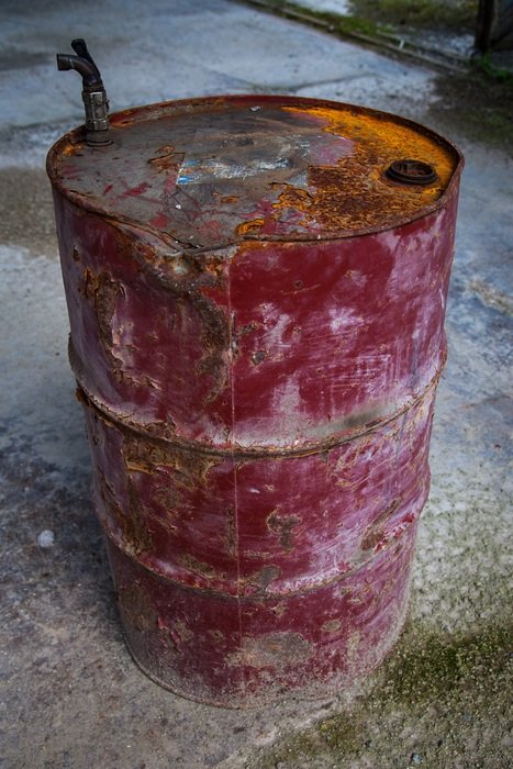 rusty red barrel close up