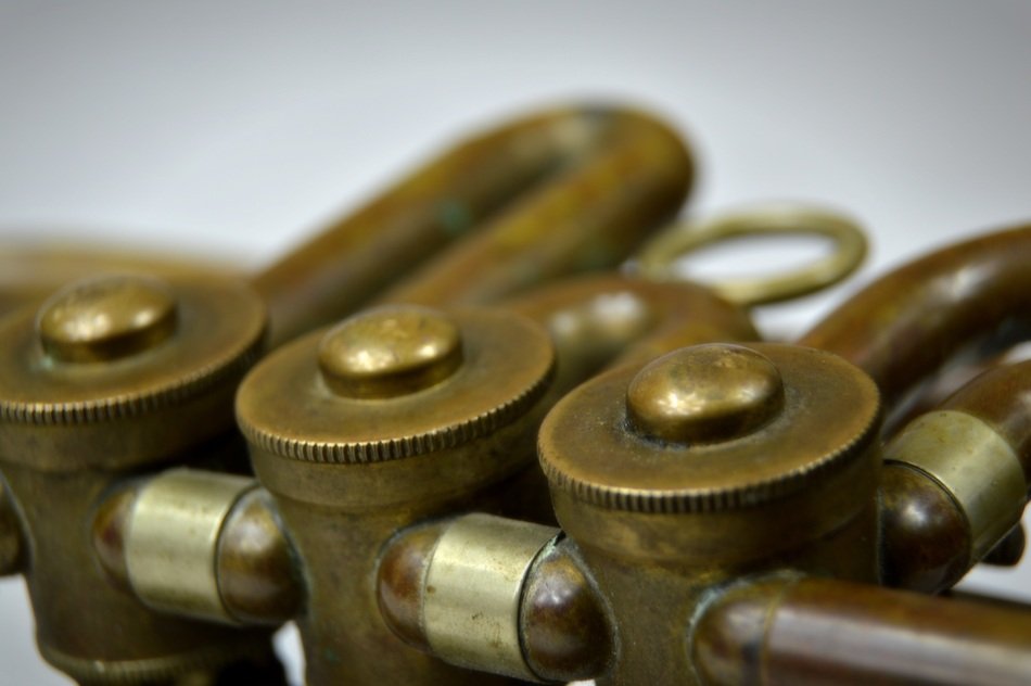 buttons on copper tubes