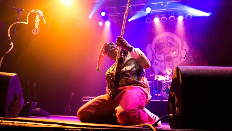 musicians at a concert in bright lights