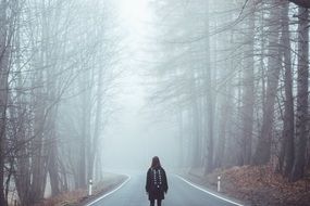 girl in a misty forest