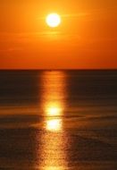 orange sunset over the water