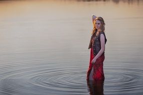 photo session of a young girl in a lake