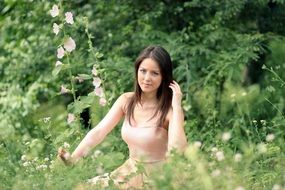 girl posing in the grass