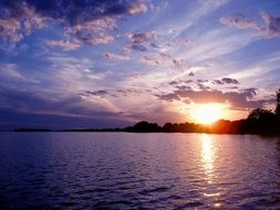 sunset over a calm picturesque lake