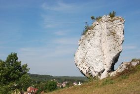 white boulder on a hillside in Poland