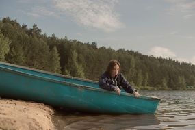 Girl in the boat in the ocean