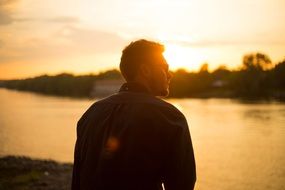 man admiring beatuful evening