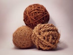 three skeins with coarse threads
