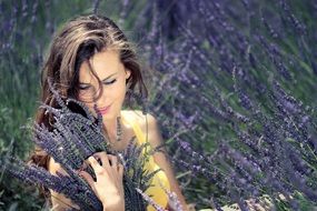 beatuful young woman with lavender bouquet
