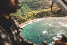 Pilot Flying above Sceneic landscape