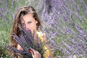 dark blonde young woman in the lavender field