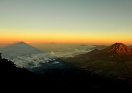 orange horizon over the mountains during sunset