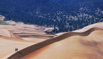 sand dune hiking in scenic landscape