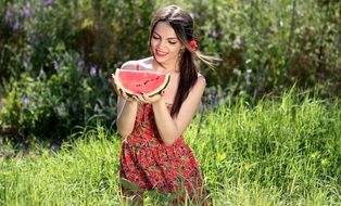 attractive young woman with watermelon