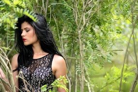 beautiful brunette in the forest