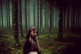 Little Red Riding Hood in the forest