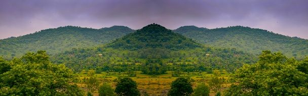 green hills with green valleys