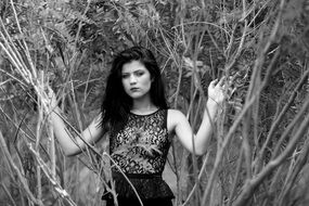 brunette in the forest in black and white